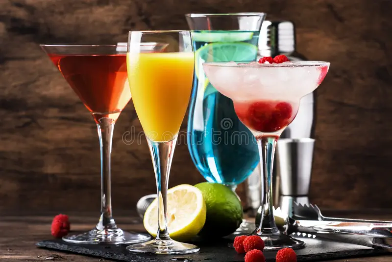 Colorful Summer Cocktails Cold Alcoholic Beverages Drinks Mimosa Cosmopolitan Raspberry Margarita Blue Hawaii Wooden 156655028